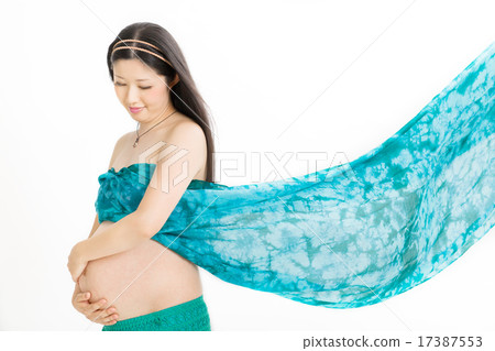 Pregnant women in belly dance costumes 17387553