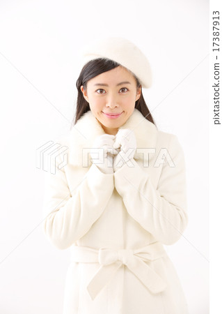 A young woman in a coat 17387913