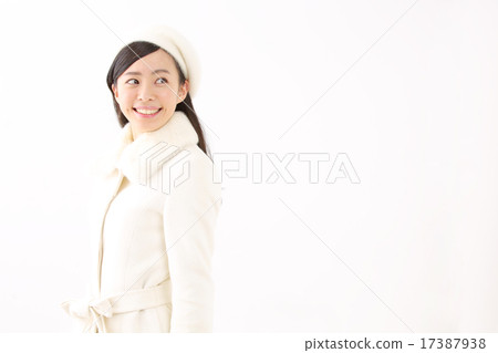 A young woman in a coat 17387938
