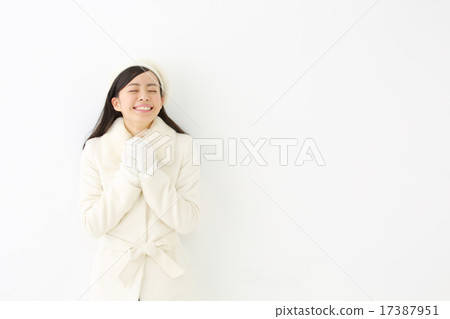 A young woman in a coat 17387951
