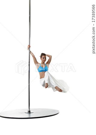 Image of charming female dancer spinning on pole 17389566