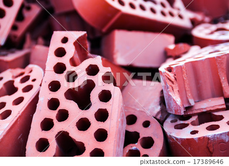 Pile of new but beaten silicate bricks Pile of new but beaten silicate bricks 17389646