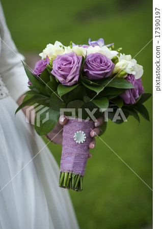 bridal bouquet of purple and white roses 17390197