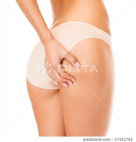 woman in cotton underwear showing slimming concept woman in cotton underwear showing slimming concept 17391762