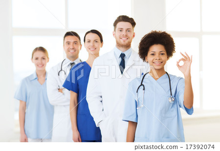group of happy doctors at hospital group of happy doctors at hospital 17392074