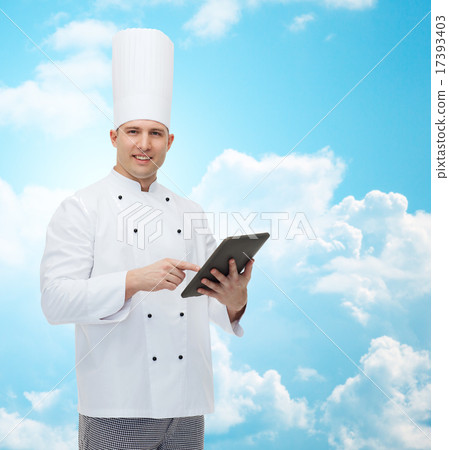 happy male chef cook holding tablet pc happy male chef cook holding tablet pc 17393403