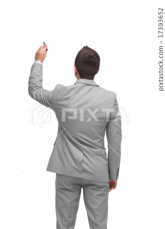 businessman writing or drawing something imaginary businessman writing or drawing something imaginary 17393652