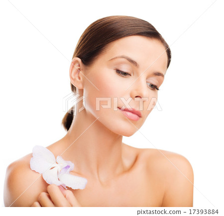 relaxed woman with orhid flower relaxed woman with orhid flower 17393884