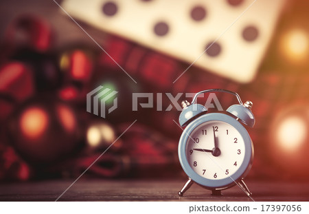Alarm clock and christmas gifts on background. Alarm clock and christmas gifts on background. 17397056