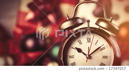 Alarm clock and christmas gifts on background. 17397057