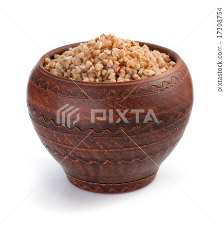 buckwheat in pot isolated on white 17398754