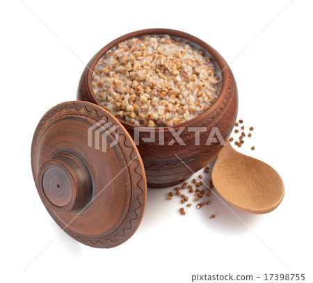 buckwheat in pot isolated on white 17398755