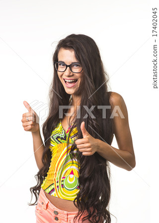 Charming girl is showing big fingers up. 17402045