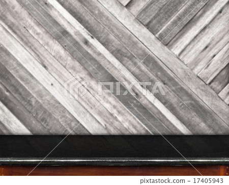 black marble table and blurred plank wood wall 17405943