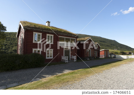 Typical red scandinavian wooden house, grassy roof Typical red scandinavian wooden house, grassy roof 17406651