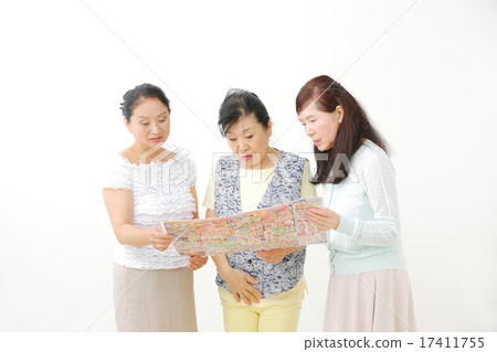 A housewife watching a flyer A housewife watching a flyer 17411755