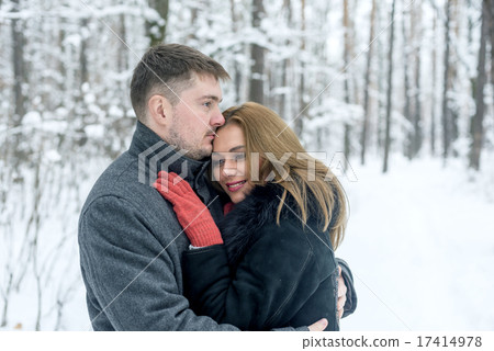 Portrait of happy couple in winter park Portrait of happy couple in winter park 17414978