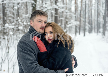 Portrait of happy couple in winter park Portrait of happy couple in winter park 17414979