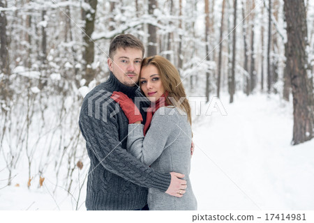 Portrait of happy couple in winter park Portrait of happy couple in winter park 17414981