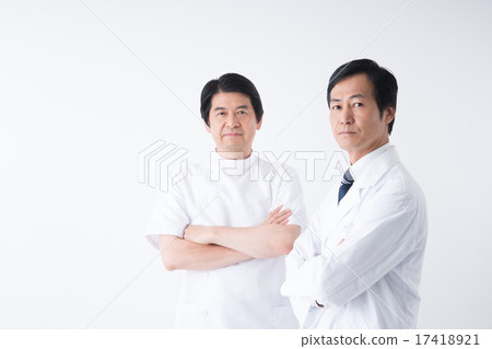 Stock Photo: camera gaze, middle and old aged, doctor