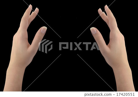 Woman's healing hands isolated on black Woman's healing hands isolated on black 17420551