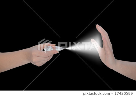 Hand holding Vogel wand-crystal healing tool 17420599