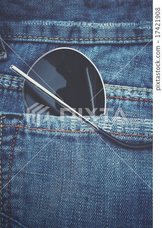 Glasses in jeans pocket Glasses in jeans pocket 17421908