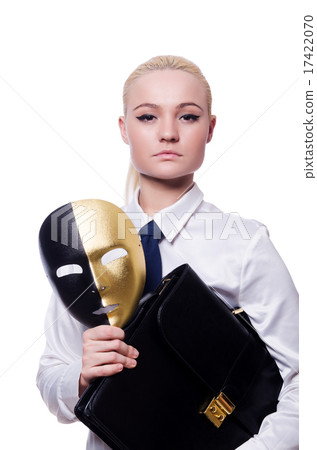 Woman with mask in hypocrisy concept Woman with mask in hypocrisy concept 17422070