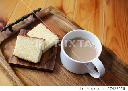 Sliced castella cake and hot cafe au lait Sliced castella cake and hot cafe au lait 17422656