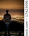 A man watching the night view A man watching the night view 17423096
