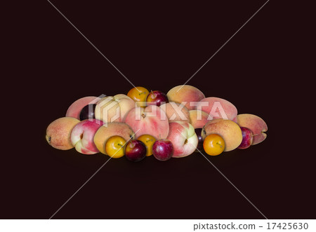 Stone fruit peaches, plums and apricots on black Stone fruit peaches, plums and apricots on black 17425630