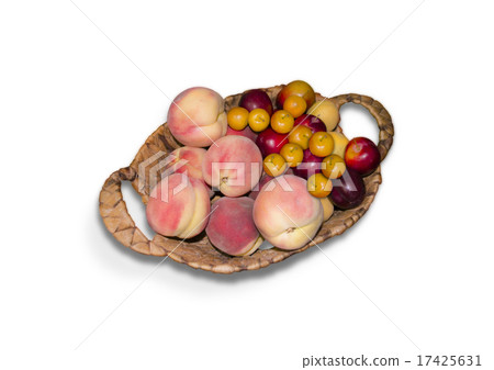Old straw basket with peaches and plumson Old straw basket with peaches and plumson 17425631