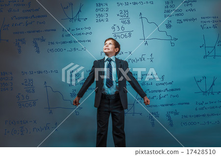 a boy of twelve European appearance in a suit holding a blank sh a boy of twelve European appearance in a suit holding a blank sh 17428510