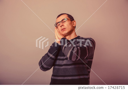 European-looking man of 30 years in glasses wants to sleep ret European-looking man of 30 years in glasses wants to sleep ret 17428715
