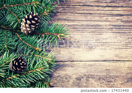 Christmas fir tree on a wooden background Christmas fir tree on a wooden background 17431440