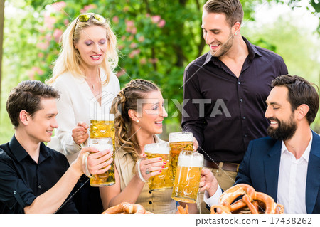Friends or colleagues on beer garden after work 17438262