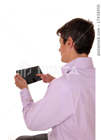 Man with tablet from back. Man with tablet from back. 17438450