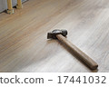 hammer on the wooden floor 17441032