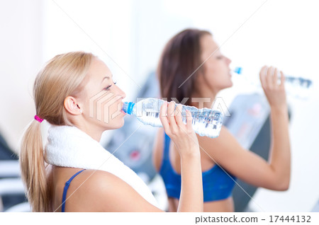 Women drinking water after sports Women drinking water after sports 17444132