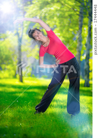Stretching woman in outdoor sport exercise. 17444448