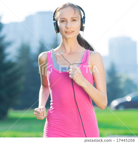 Jogging woman running in city park 17445208