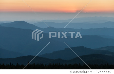 Distant mountain range and thin layer of clouds Distant mountain range and thin layer of clouds 17453530