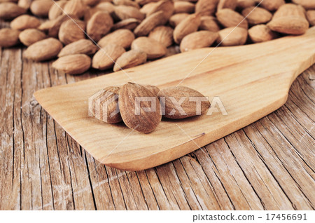 shelled almonds on a wooden table 17456691