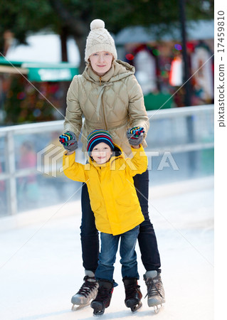 family ice skating family ice skating 17459810