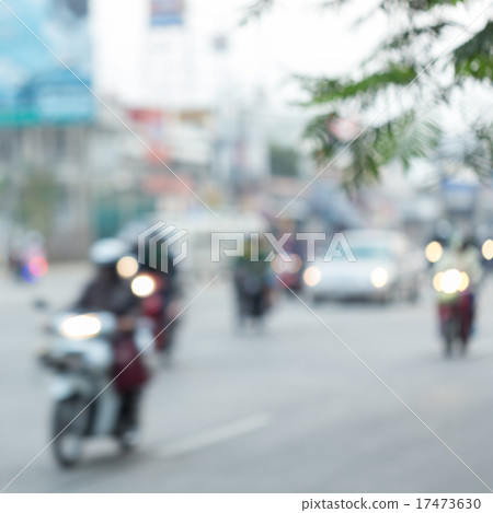 car and motorcycle driving on road with traffic car and motorcycle driving on road with traffic 17473630