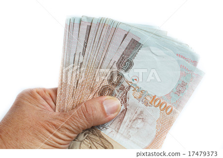 Hand holding thai money. Hand holding thai money. 17479373