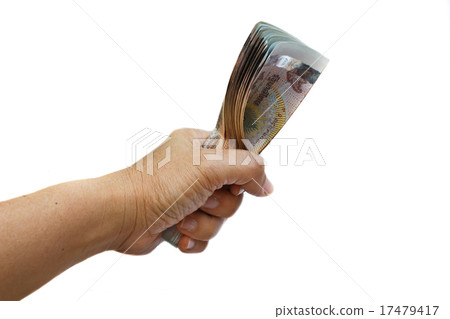 Hand holding thai money. Hand holding thai money. 17479417