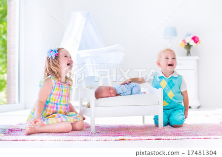 Kids playing with new born baby brother Kids playing with new born baby brother 17481304