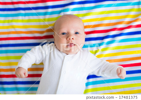 Cute baby on a colorful blanket 17481375