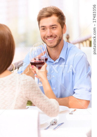 Loving couple drinking wine  17483356